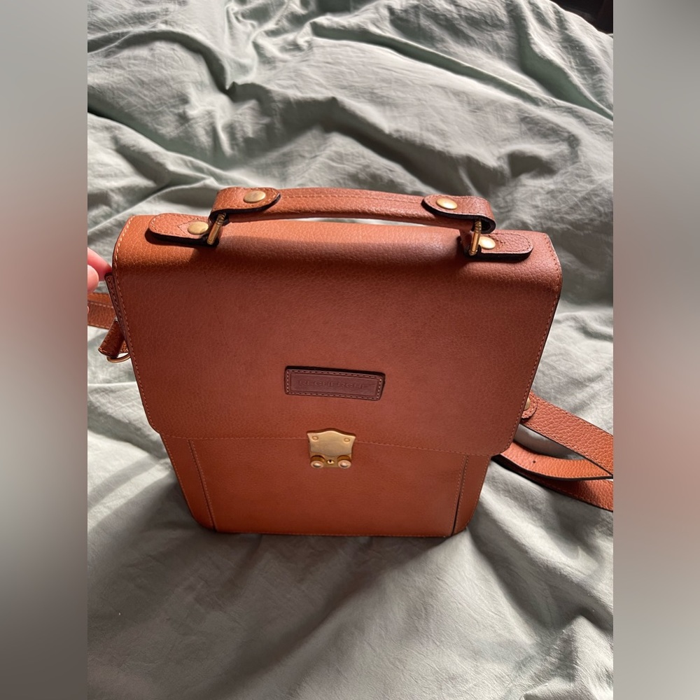 Leather brown bag .